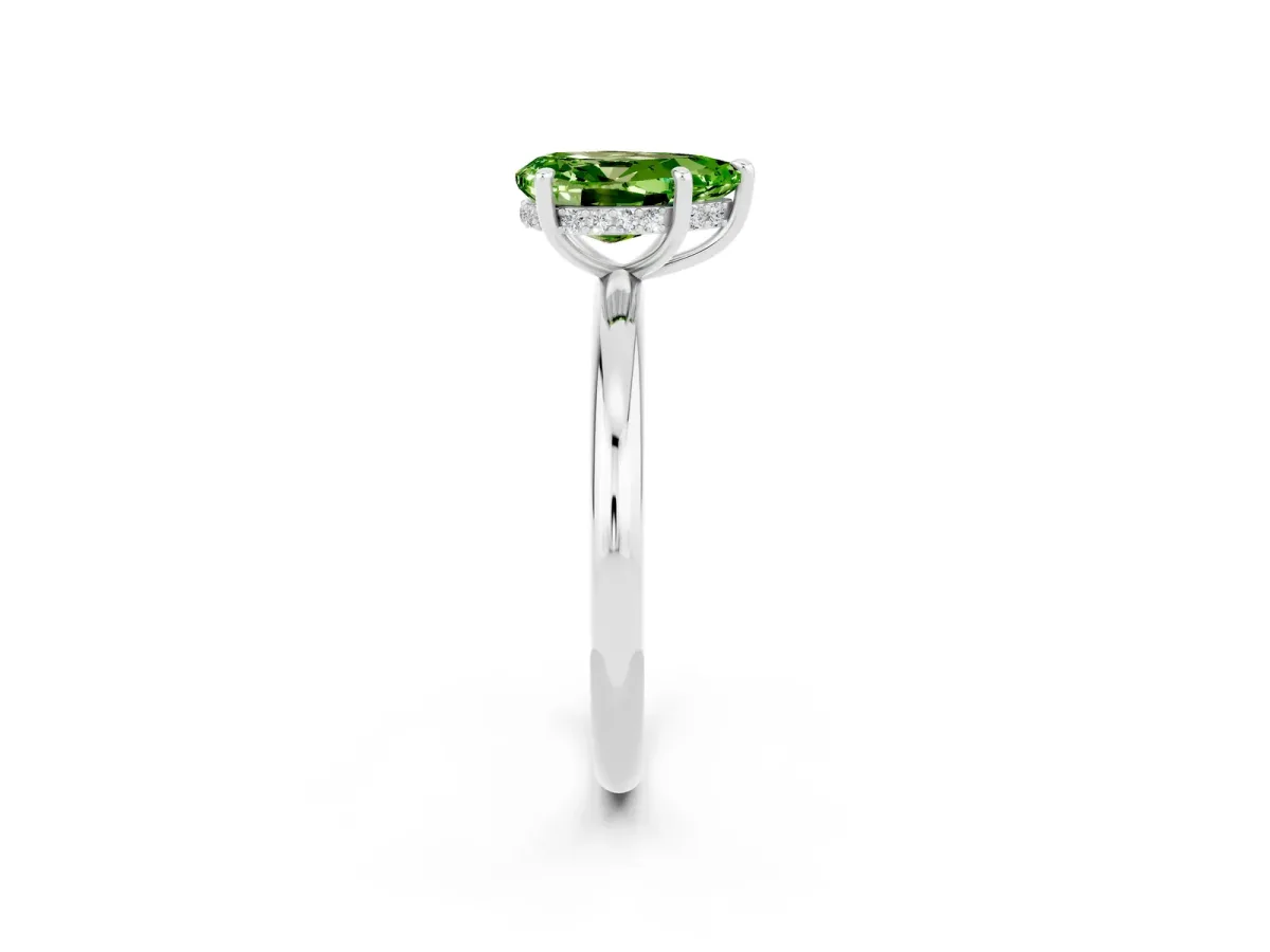 Pear Cut Peridot Solitaire Ring with Thin Band and Four-Prong Setting Silver