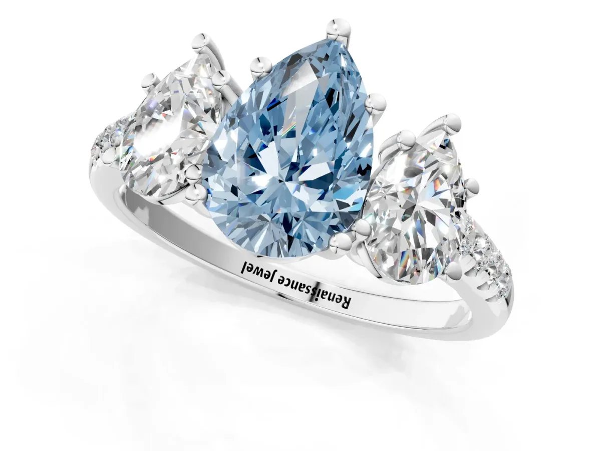 Fancy Blue Three-Stone Pear Cut Diamond Ring with Round Pavé Band and Prong Setting Platinum