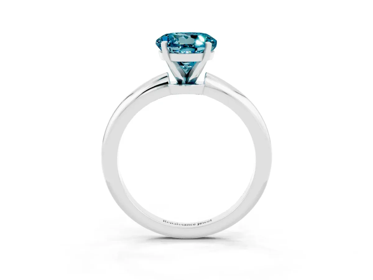 Round Cut Blue Topaz Solitaire Ring with Six-Prong Setting and Classic Band Silver