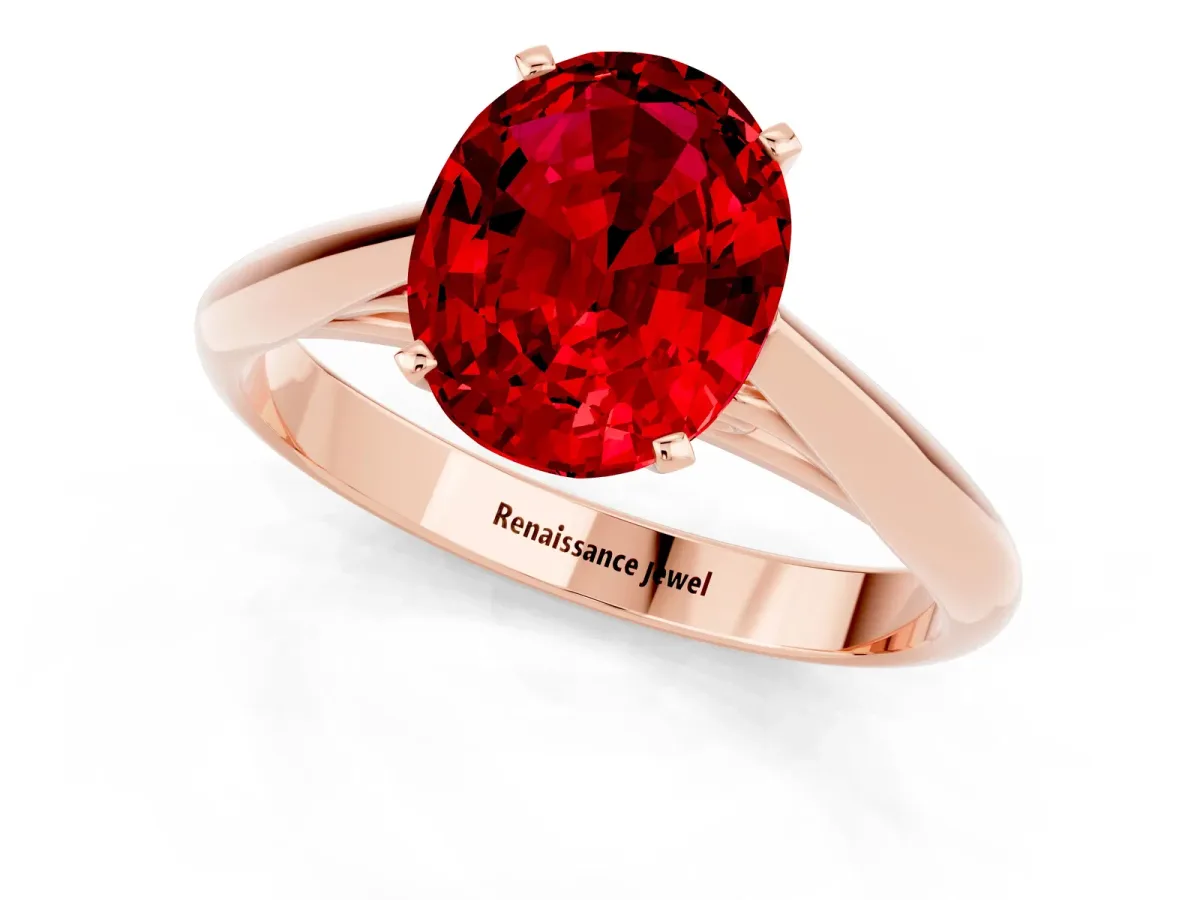 Oval Cut Ruby Solitaire Engagement Ring with Cathedral Setting and Four-Prong Mount Rose gold