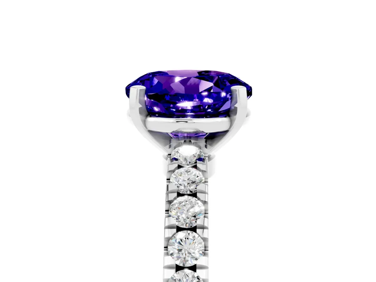 Round Cut Solitaire Tanzanite with Pavé Band and Four-Prong Setting Silver