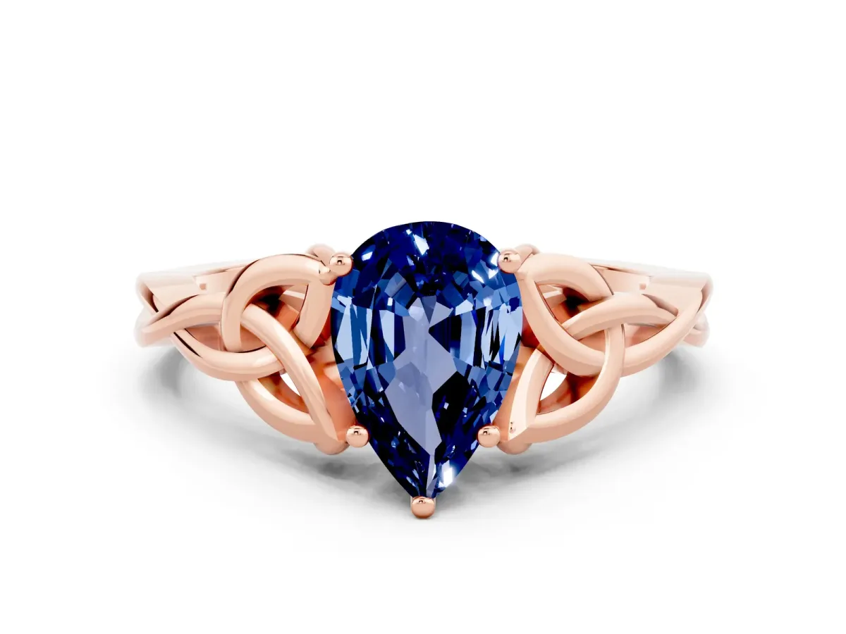 Pear Cut Blue Sapphire Solitaire Celtic Knot Ring with Four-Prong Setting Rose gold