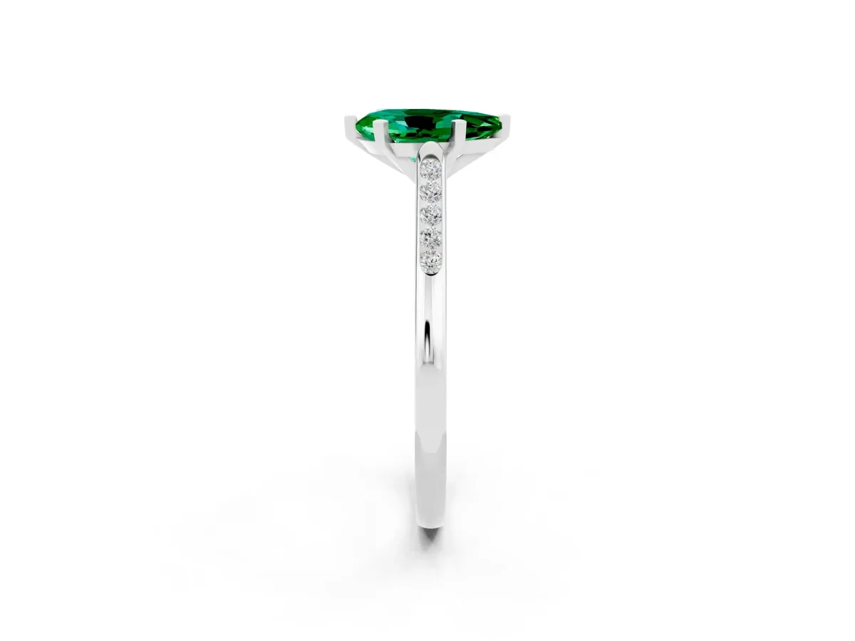 Pear Cut Emerald Solitaire Ring with Channel Set Round Band and Prong Setting Silver
