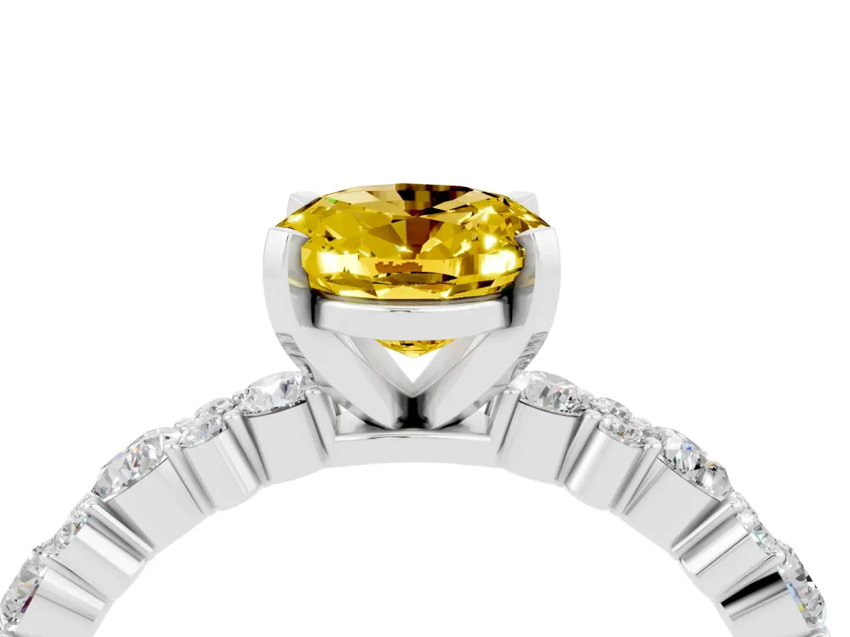 Oval Cut Yellow Sapphire Side Stone Solitaire Ring with Round and Four-Prong Setting Silver