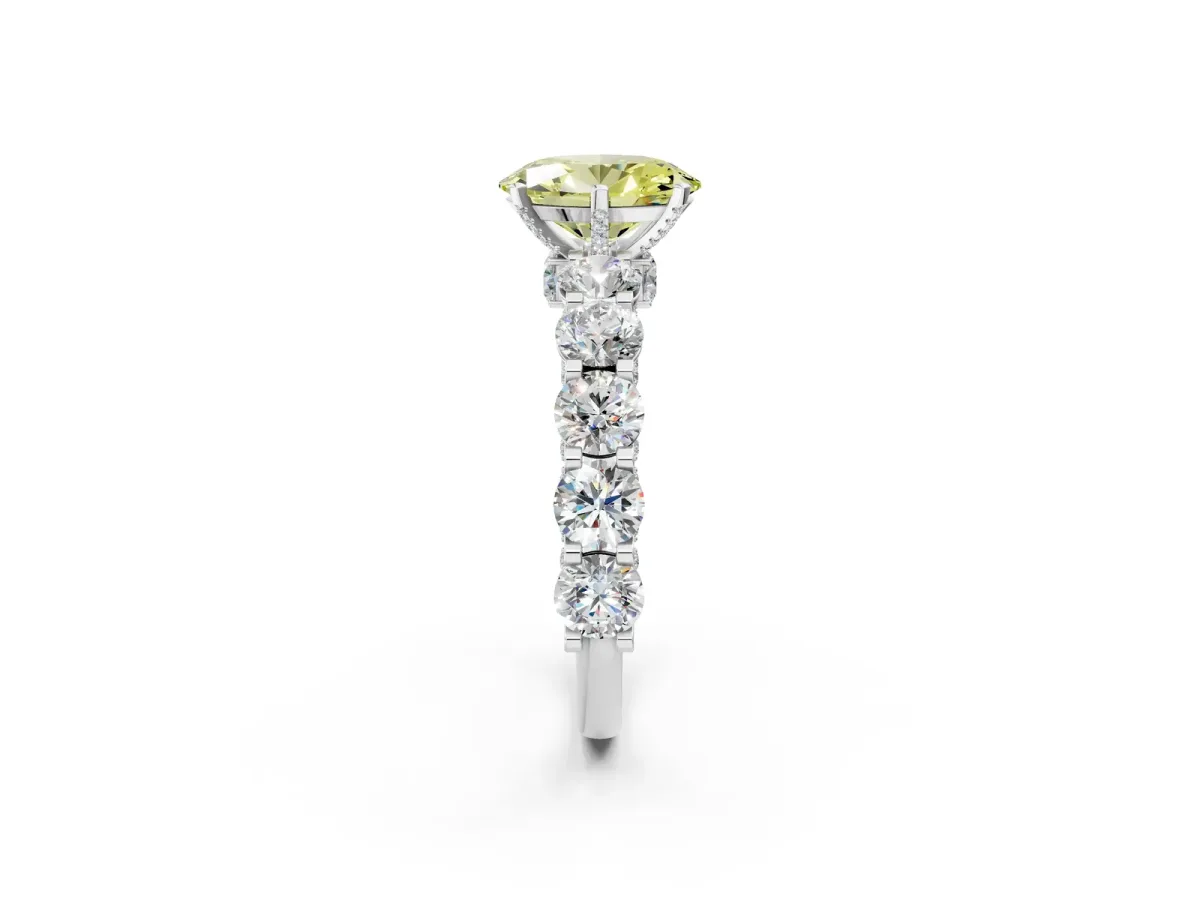 Fancy Yellow Oval Cut Diamond Side Stone Engagement Ring with Four-Prong Setting White gold