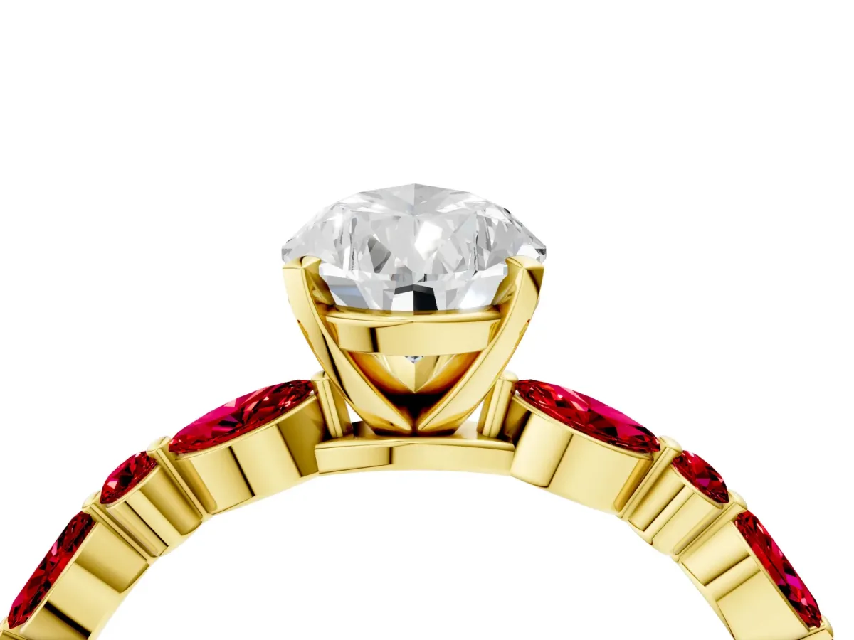 Pear Cut Diamond Ring with Marquise and Round Ruby Side Stones and Four-Prong Setting Yellow gold