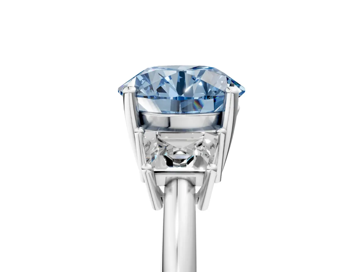 Fancy Blue Round Cut Diamond Three-Stone Ring with Trapezoid Side Stones and Prong Setting White gold