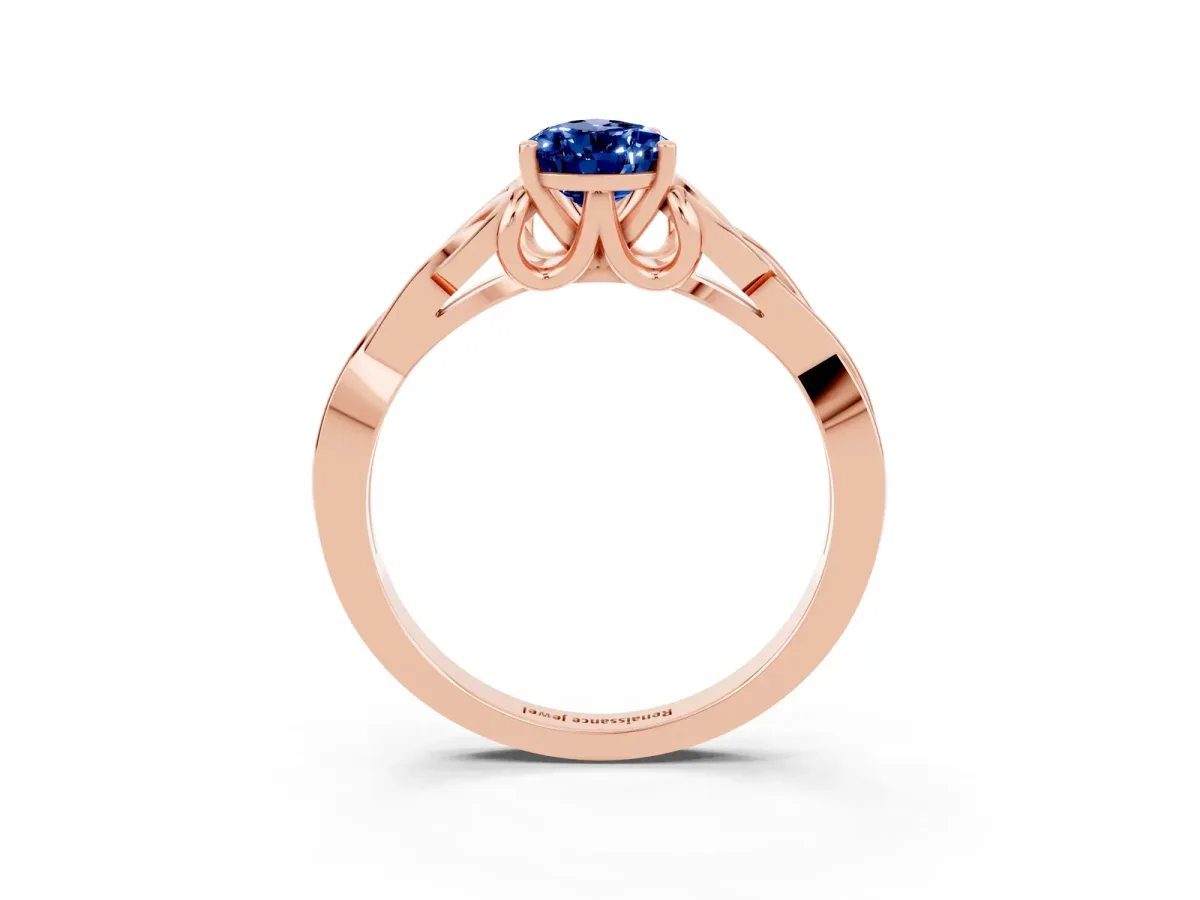 Pear Cut Blue Sapphire Solitaire Celtic Knot Ring with Four-Prong Setting Rose gold