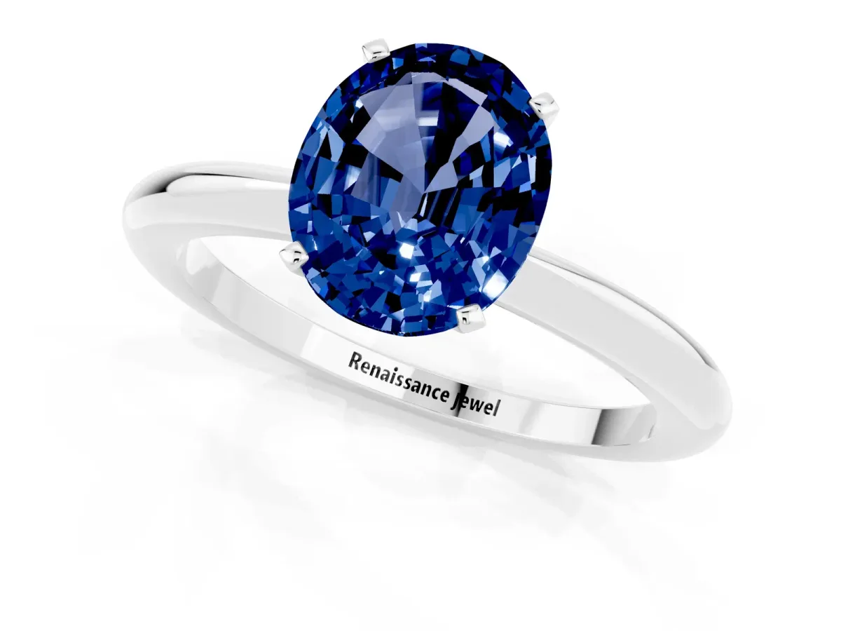 Oval Cut Blue Sapphire Solitaire Ring with Six-Prong Setting and Classic Band Platinum