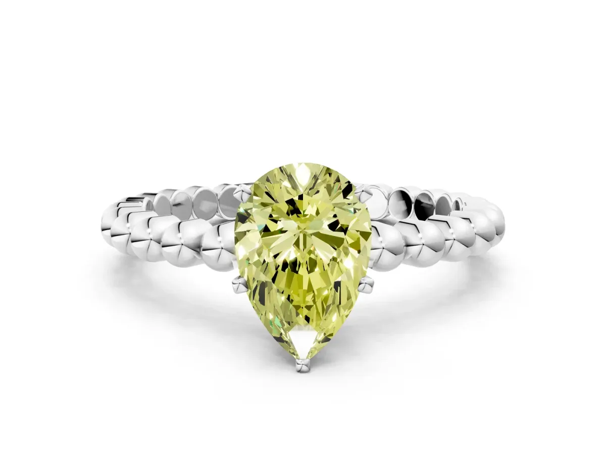 Fancy Yellow Pear Cut Diamond Solitaire Ring with Beaded Band and Prong Setting Silver