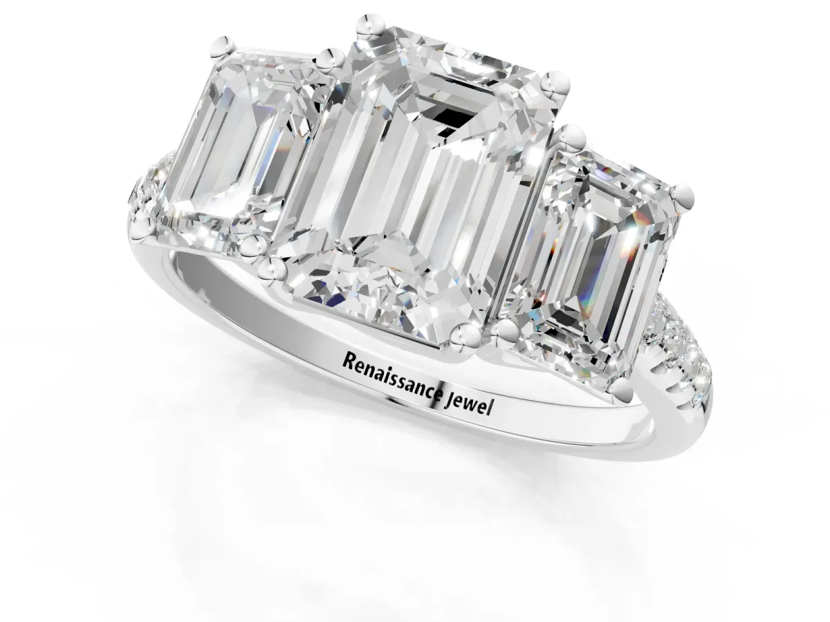 Three-Stone Emerald Cut Diamond Ring with Round Pavé Band and Prong Setting White gold