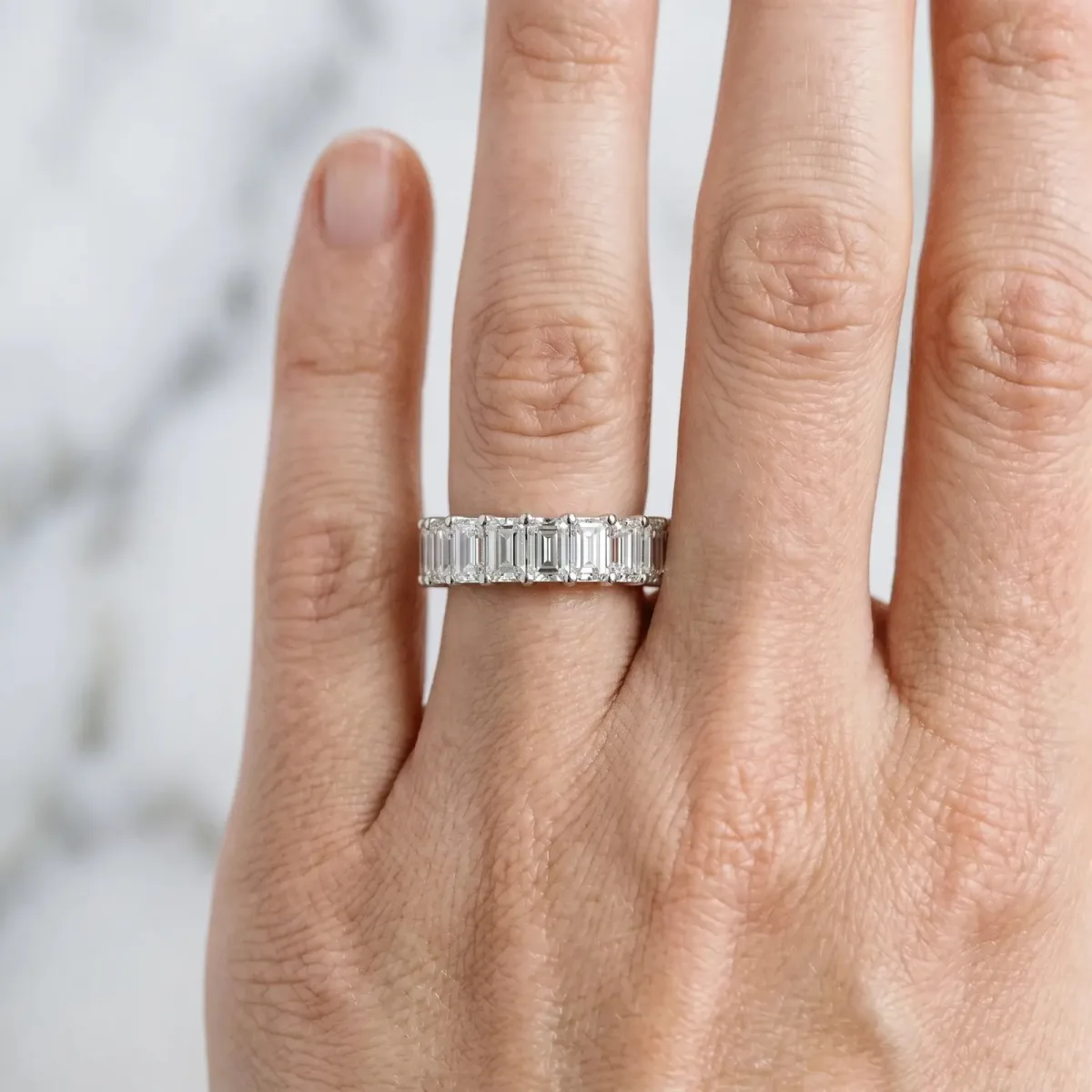 emerald Cut half eternity band with shared prong setting Silver