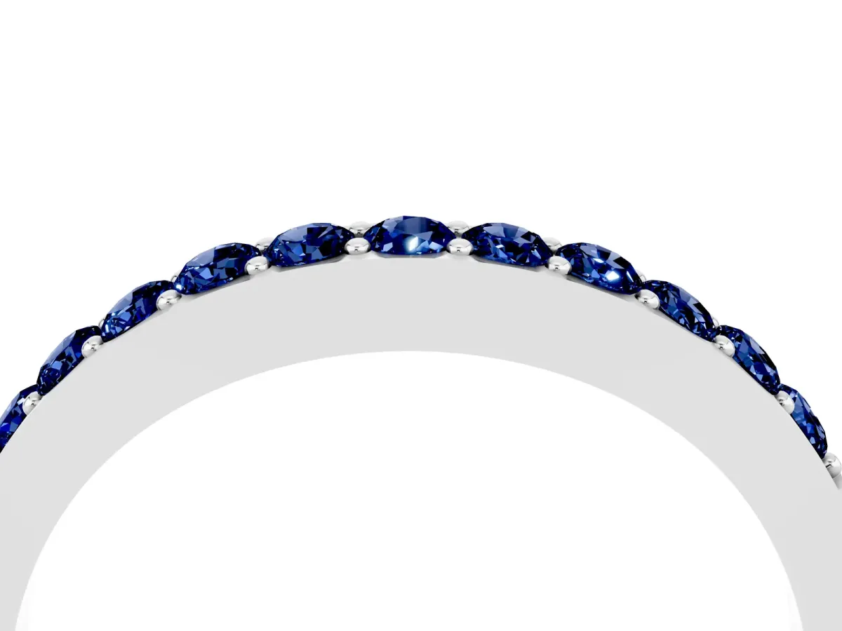 Round Blue Sapphire Curved Wedding Band with Channel Setting Platinum