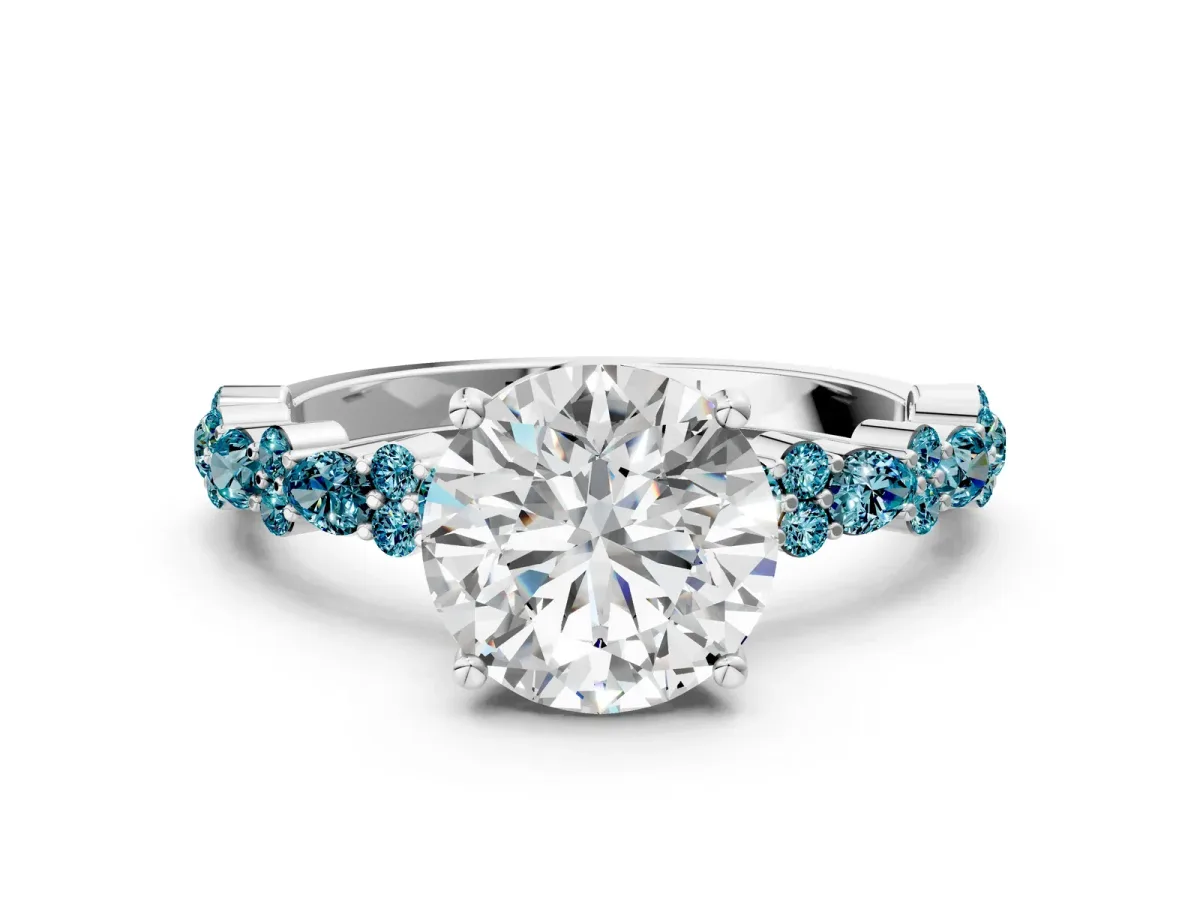 Round Cut Diamond Side Stone Solitaire Ring with Round Blue Topaz and Four-Prong Setting Silver