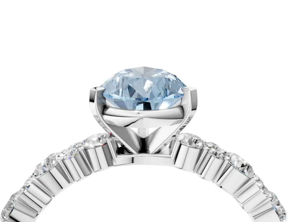 Fancy Blue Pear Cut Diamond Side Stone Solitaire Ring with Round and Four-Prong Setting Silver