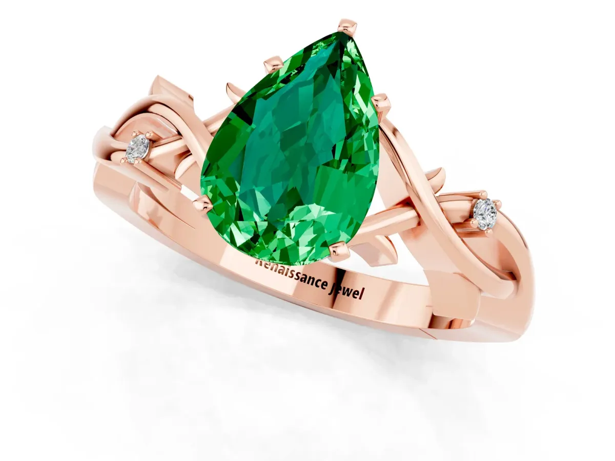 Pear Cut Emerald Solitaire Ring with Twisted Band and Prong Setting Rose gold