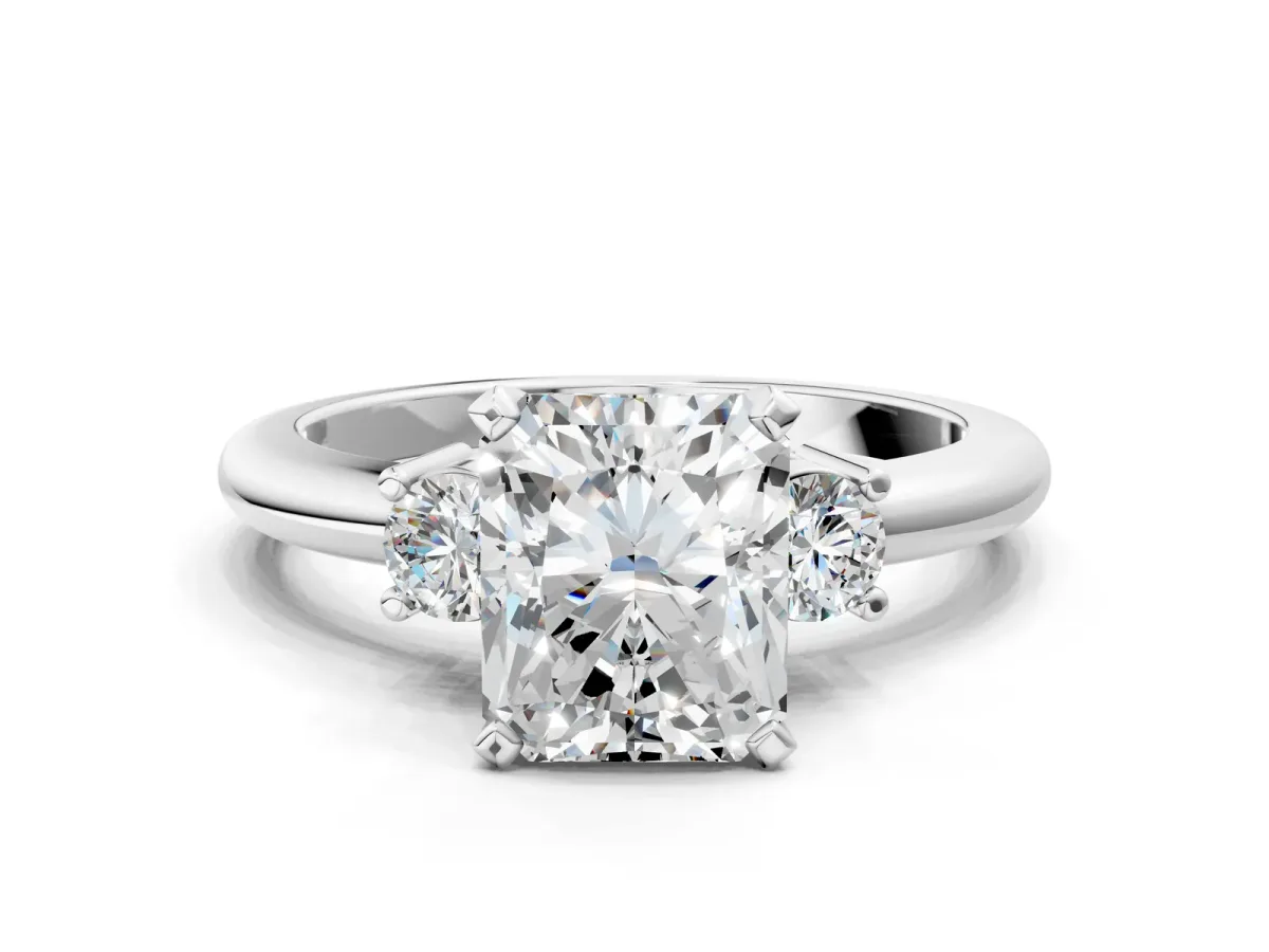 Three-Stone Radiant Cut Cut Diamond Solitaire with Prong Setting and Classic Band Platinum