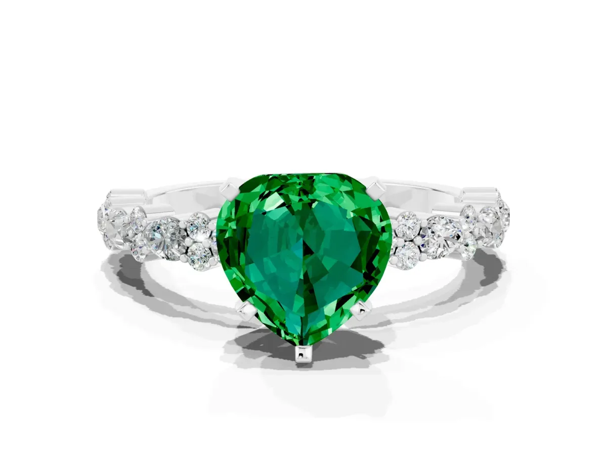 Heart Cut Emerald Side Stone Solitaire Ring with Round and Four-Prong Setting Platinum