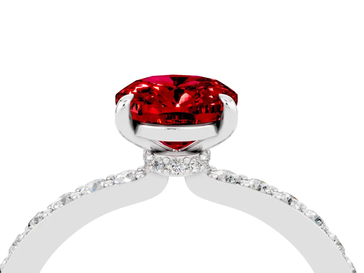 Oval Cut Ruby Solitaire Engagement Ring with Pavé Band and Four-Prong Setting Silver