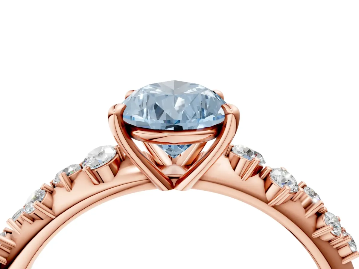 Fancy Blue Pear Cut Diamond Cluster Side Stone Solitaire Ring with Prong Setting Rose gold