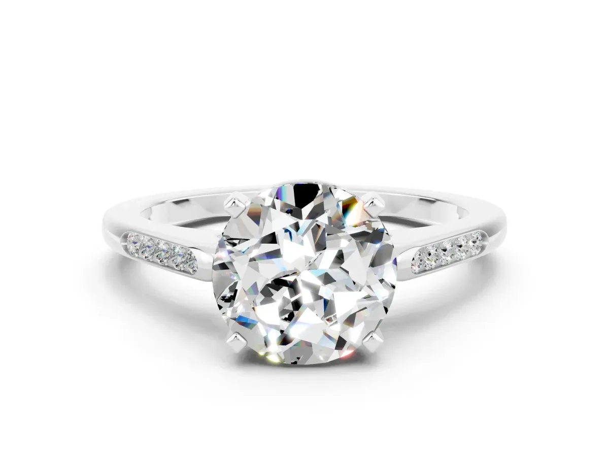 Round Cut Moissanite Solitaire Ring with Channel Set Round Band and Prong Setting Silver