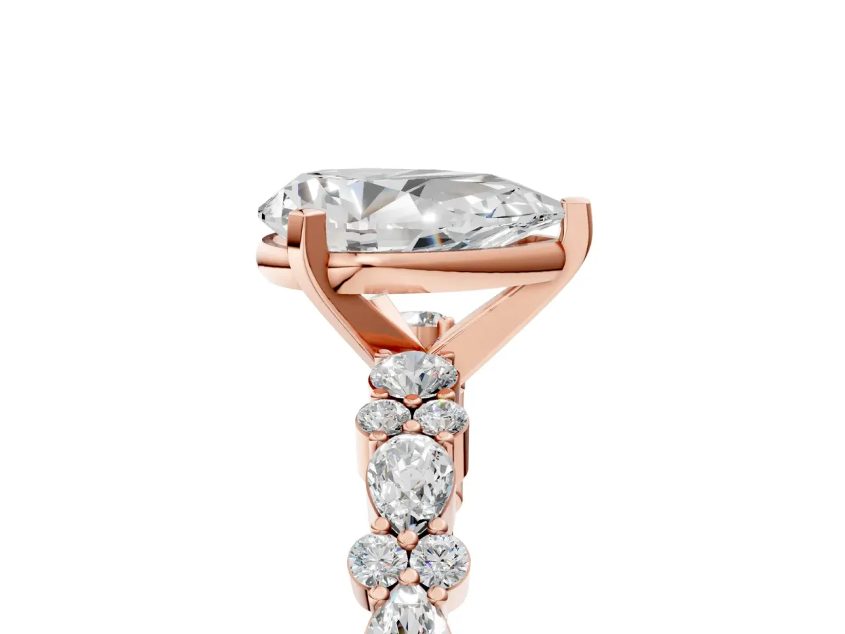 Pear Cut Diamond Side Stone Solitaire Ring with Round and Four-Prong Setting Rose gold