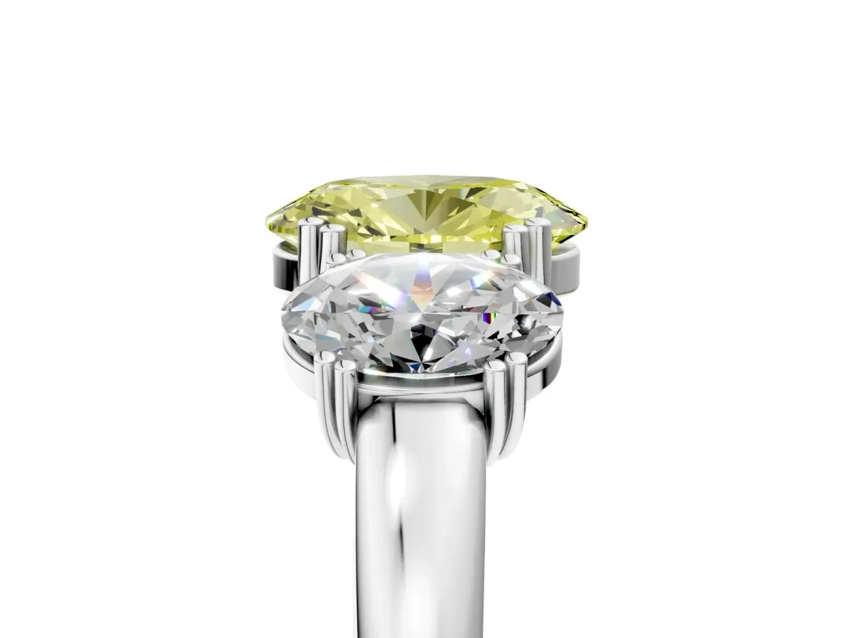 Fancy Yellow Three-Stone Oval Cut Cut Diamond Ring with Channel Set Band and Four-Prong Setting Silver