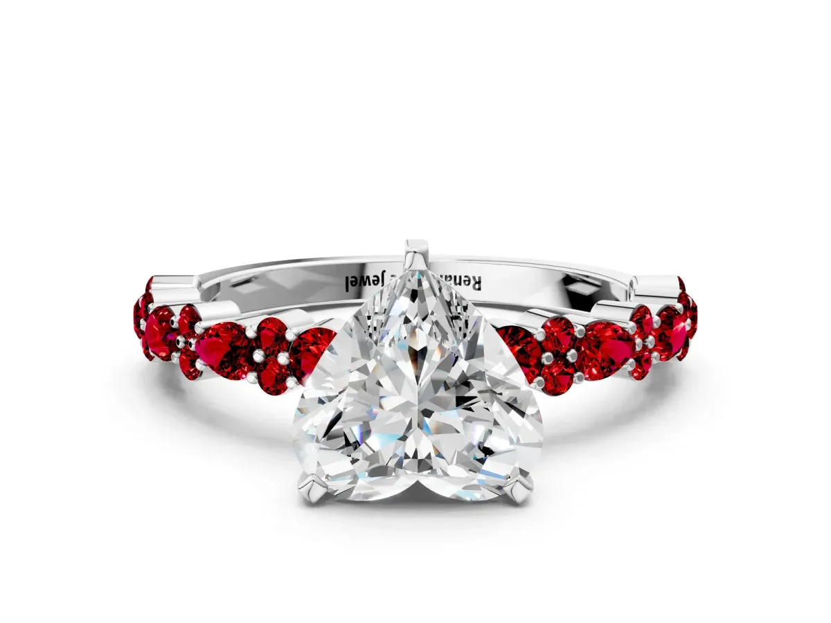 Heart Cut Diamond Side Stone Solitaire Ring with Round Ruby and Four-Prong Setting Silver