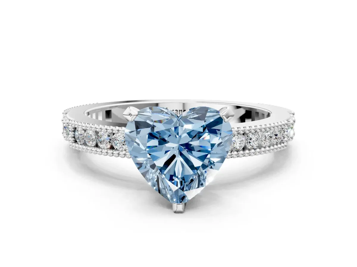 Fancy Blue Heart Cut Solitaire with Pavé Band and Four-Prong Setting Silver