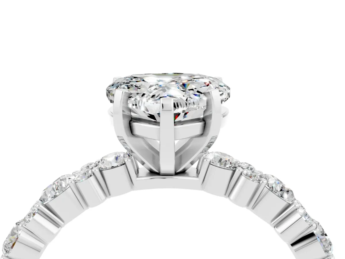 Heart Cut Moissanite Side Stone Solitaire Ring with Round and Four-Prong Setting Silver