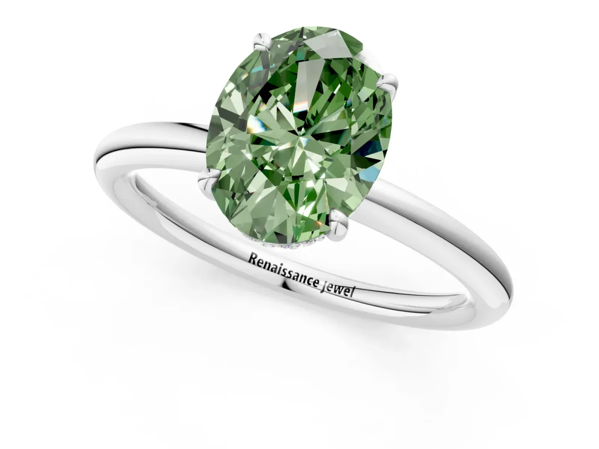 Fancy Green Oval Cut Diamond Solitaire Ring with Thin Band and Four-Prong Setting White gold