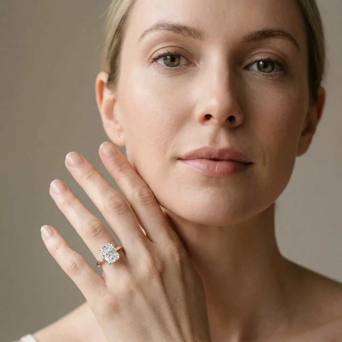 Radiant Cut Cut Solitaire Ring with Cathedral Band and Four-Prong Setting Platinum