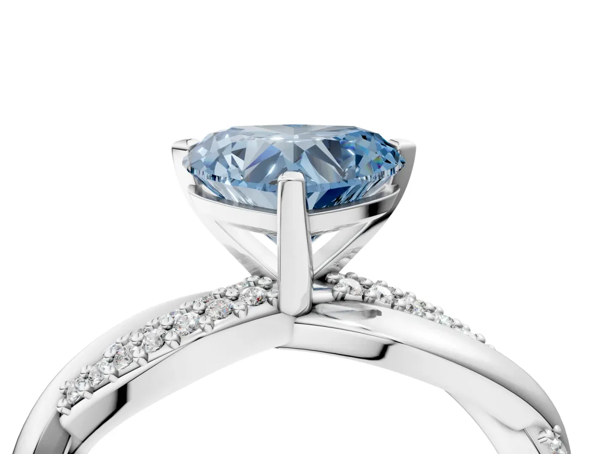 Fancy Blue Heart Cut Solitaire Twist Band with Pave Prong Setting Platinum