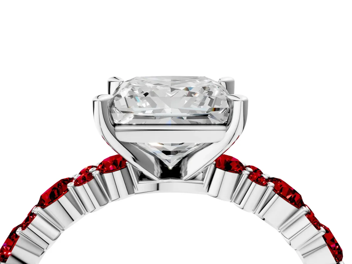 Princess Cut Diamond Side Stone Solitaire Ring with Round Ruby and Four-Prong Setting Platinum