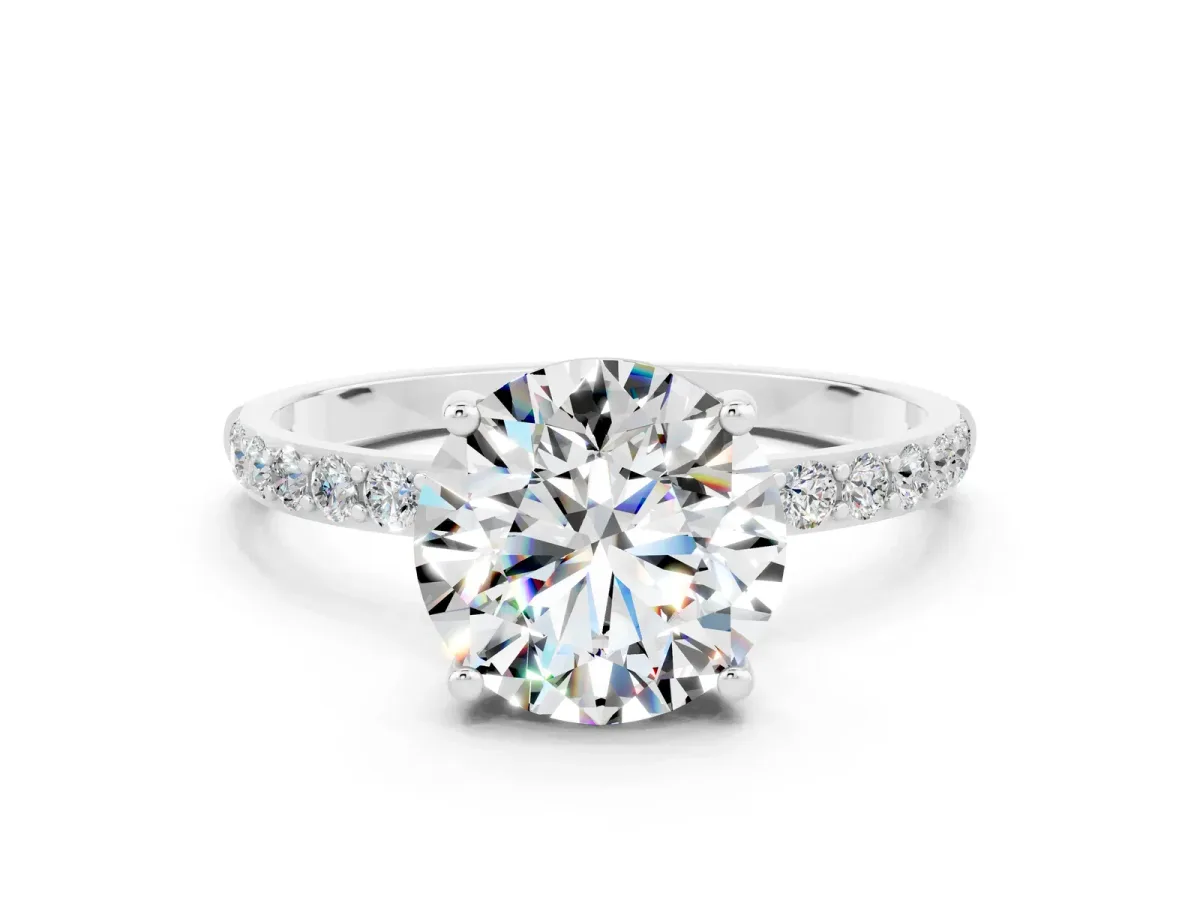Round Cut Moissanite Solitaire Ring with Round Pavé Band and Prong Setting Silver
