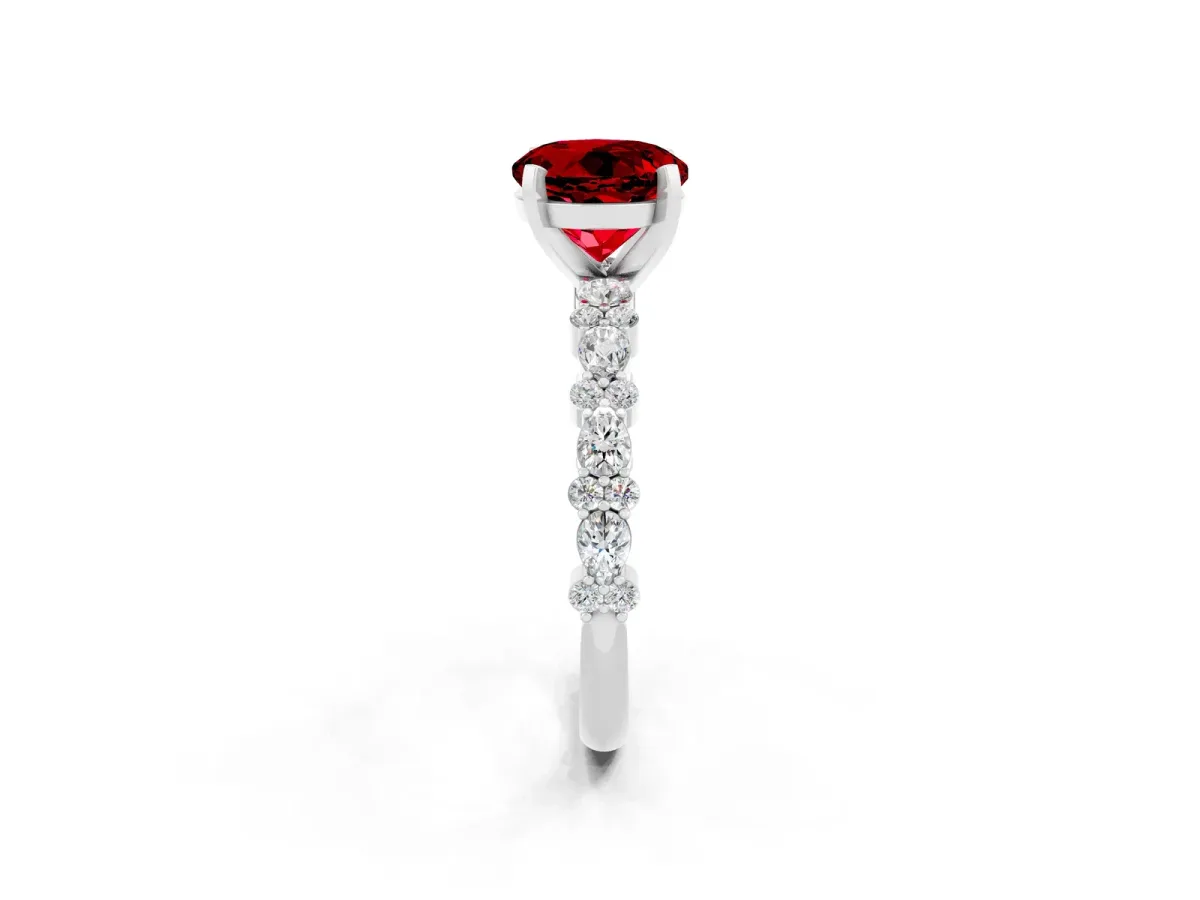 Round Cut Ruby Side Stone Solitaire Ring with Round and Four-Prong Setting White gold