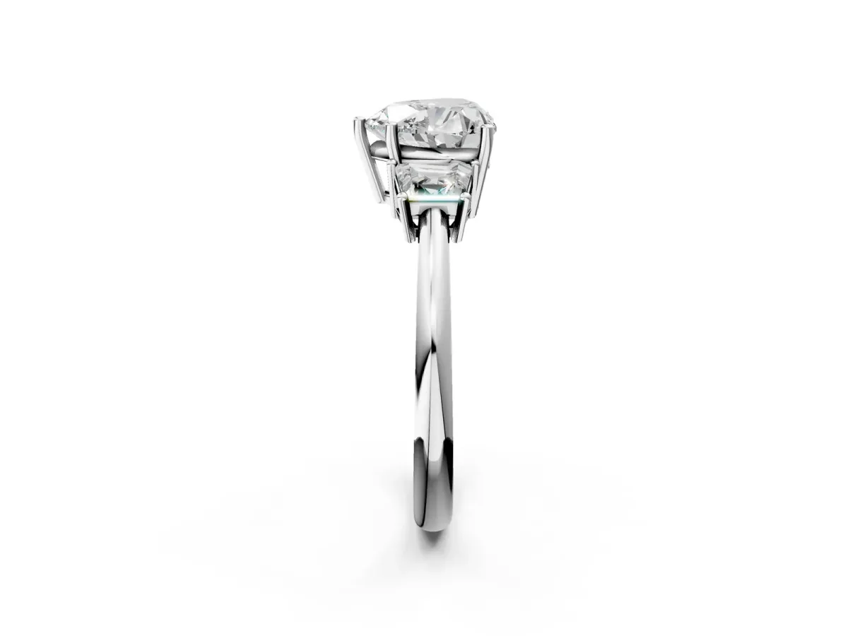 Heart Cut Diamond Three-Stone Ring with Trapezoid Side Stones and Prong Setting Platinum