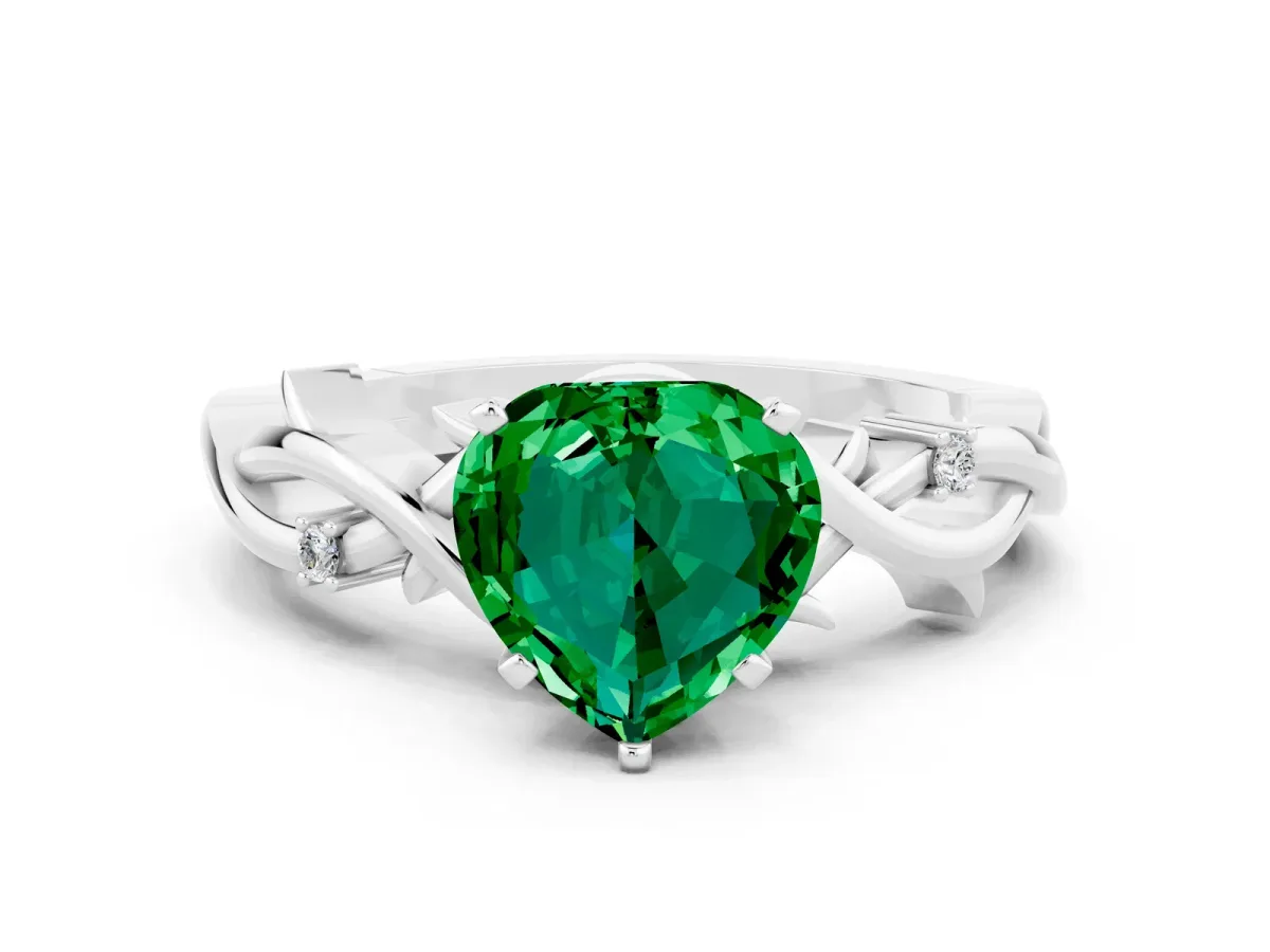 Heart Cut Emerald Solitaire Ring with Twisted Band and Prong Setting Platinum
