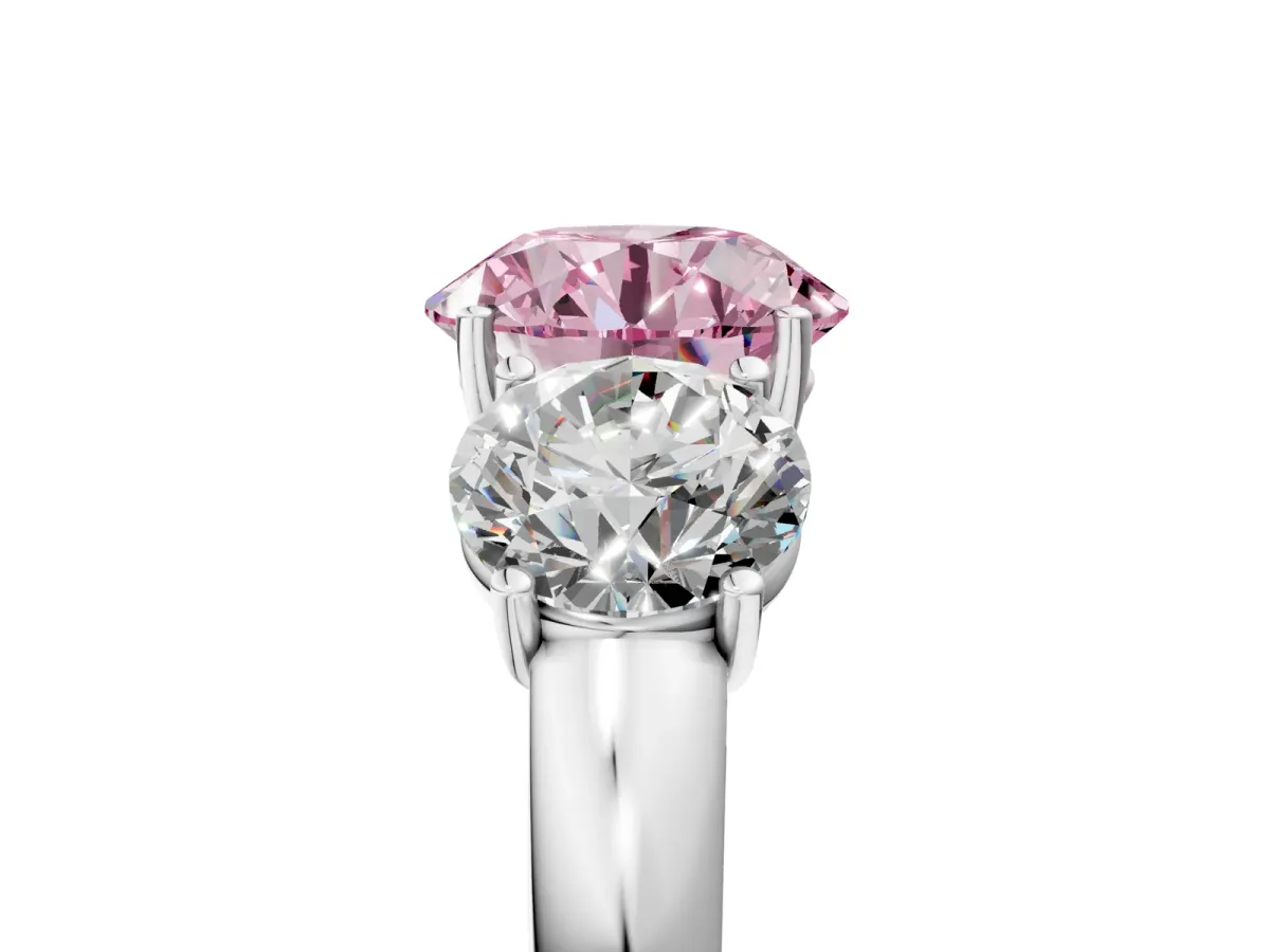 Fancy Pink Round Cut Diamond Three-Stone Ring with Four-Prong Setting and Classic Band Platinum