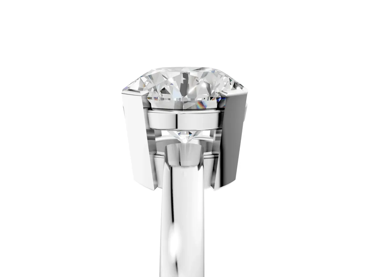 Round Cut Cut Solitaire Ring with Four-Prong Setting and Classic Band Silver