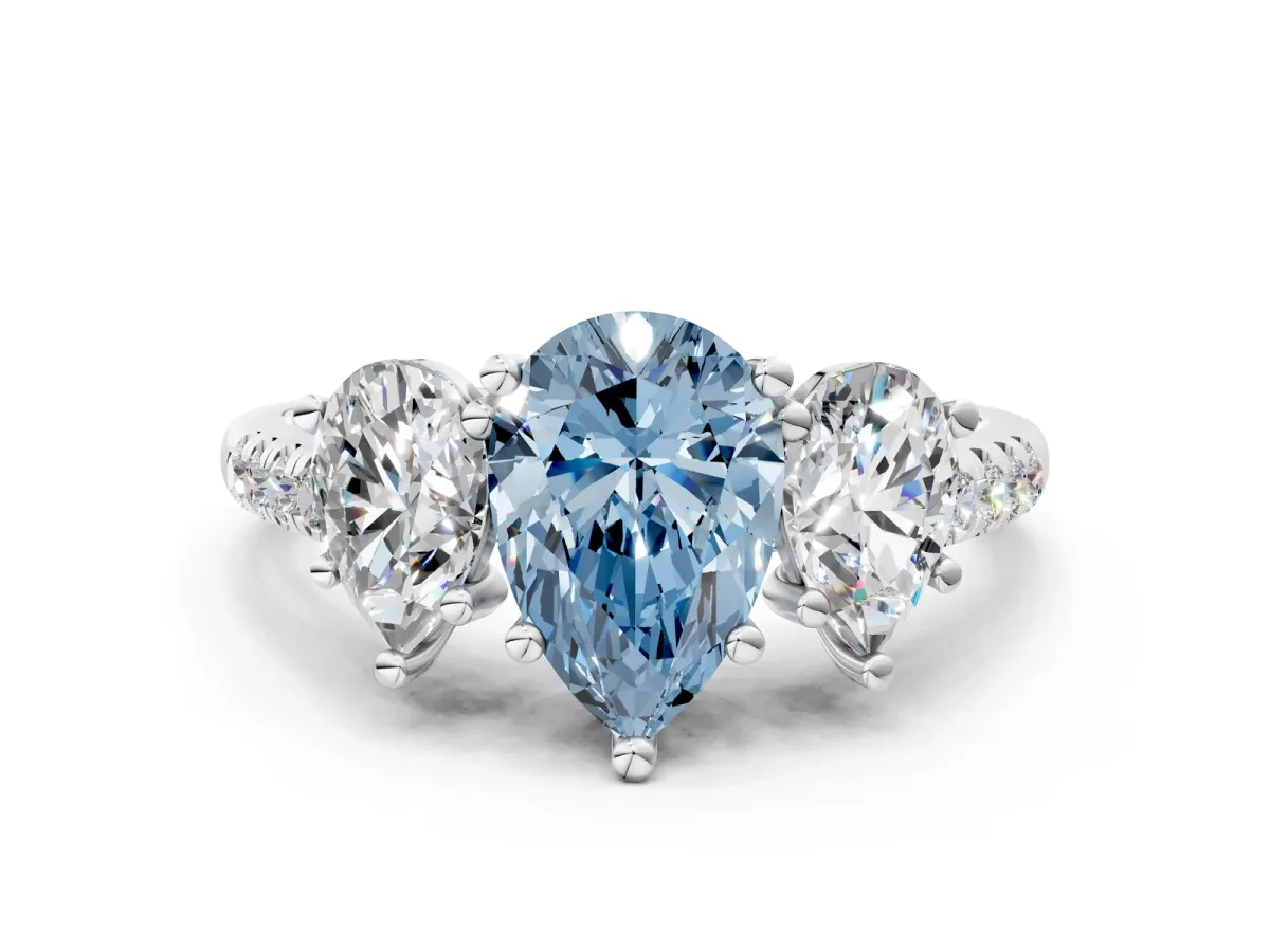 Fancy Blue Three-Stone Pear Cut Diamond Ring with Round Pavé Band and Prong Setting Platinum