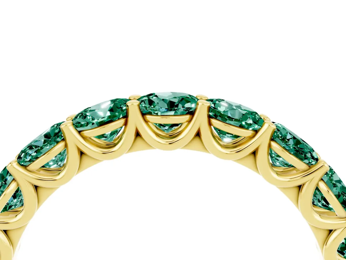 Round Green Sapphire Shared Prong Eternity Band Yellow gold