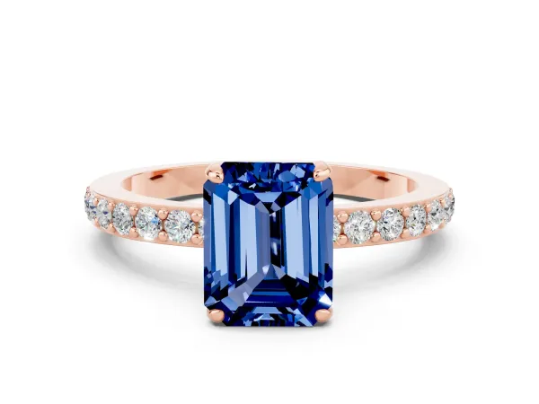 Emerald Cut Blue Sapphire Solitaire Engagement Ring with Pavé Band and Four-Prong Setting Rose gold