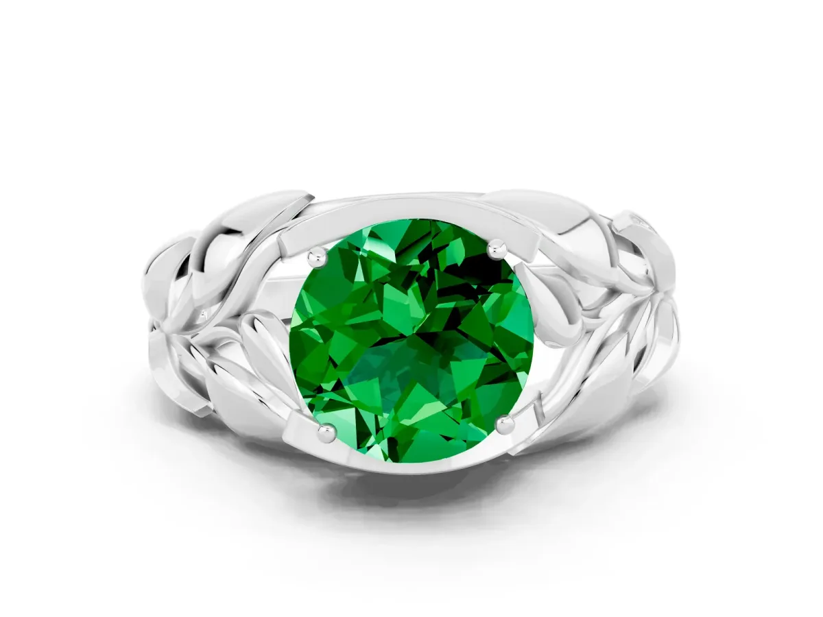 Round Cut Emerald Leaf-Inspired Engagement Ring with Round Accents and Prong Setting Silver