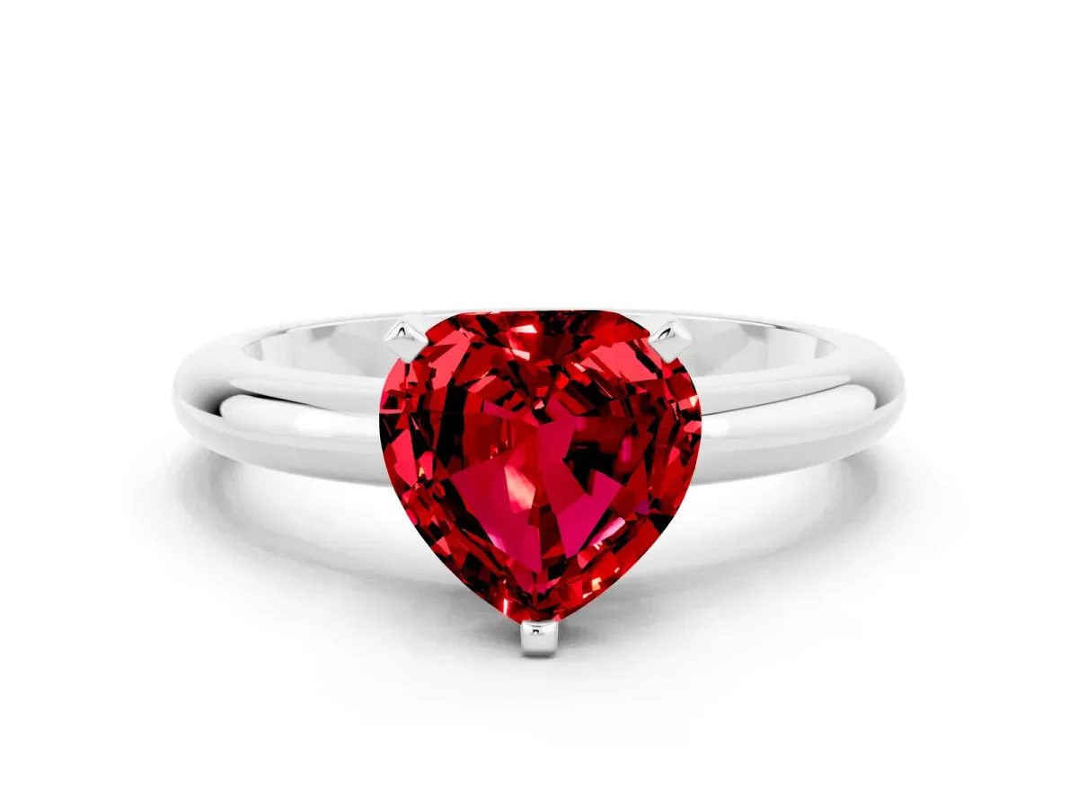 Heart Cut Ruby Solitaire Engagement Ring with Round Band and Four-Prong Setting Silver