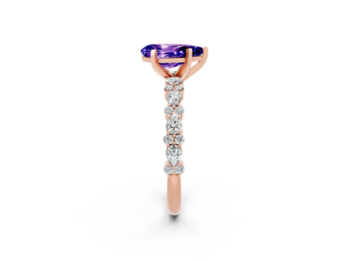 Pear Cut Tanzanite Side Stone Solitaire Ring with Round and Four-Prong Setting Rose gold