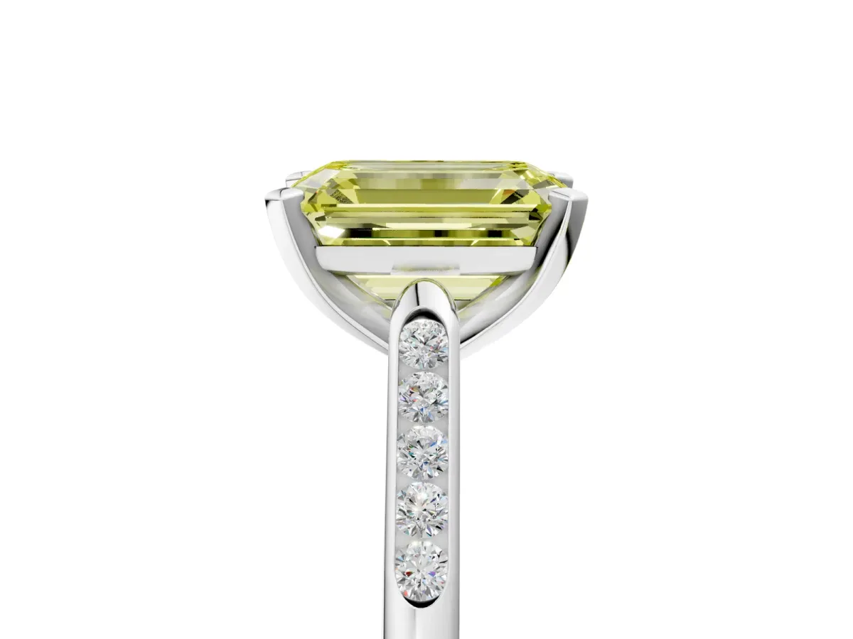 Fancy Yellow Emerald Cut Diamond Solitaire Ring with Channel Set Round Band and Prong Setting Silver