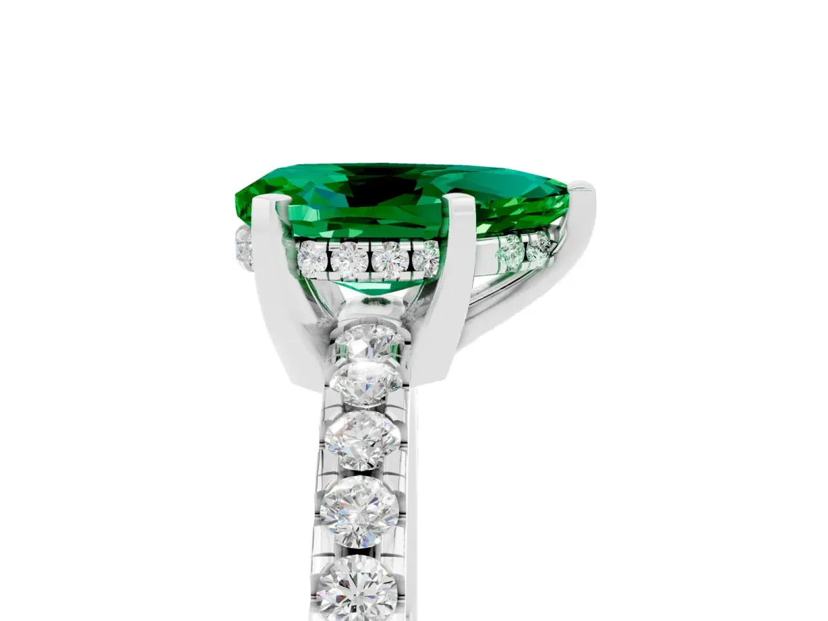 Pear Cut Emerald Solitaire Ring with Round Pavé Band and Four-Prong Setting Silver