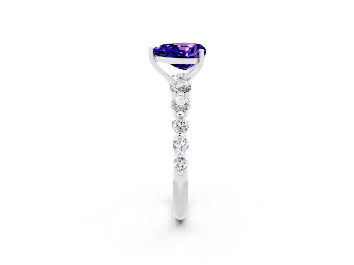 Heart Cut Solitaire Tanzanite Ring with Pave Band and Four-Prong Setting Silver