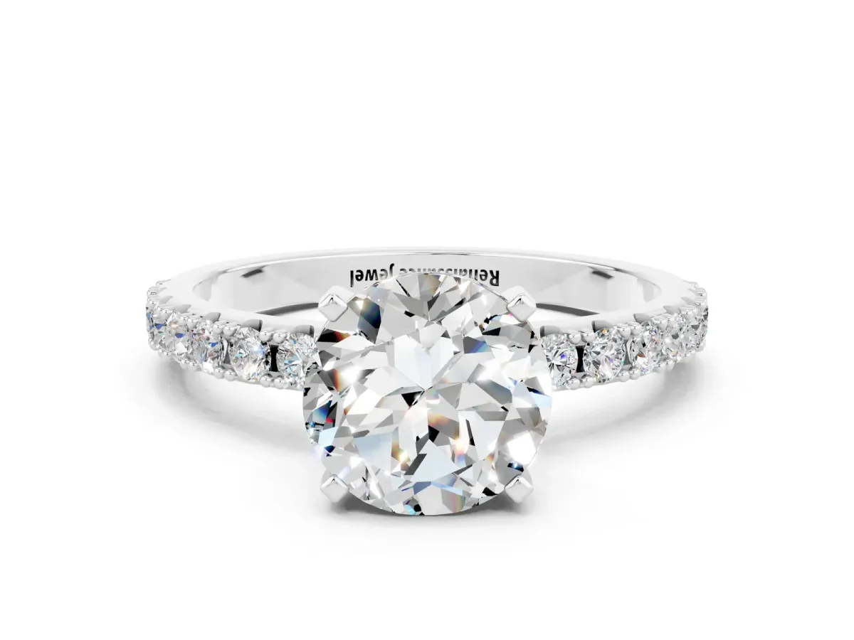 Round Cut Moissanite Solitaire Pavé Band with Four-Prong Setting Silver